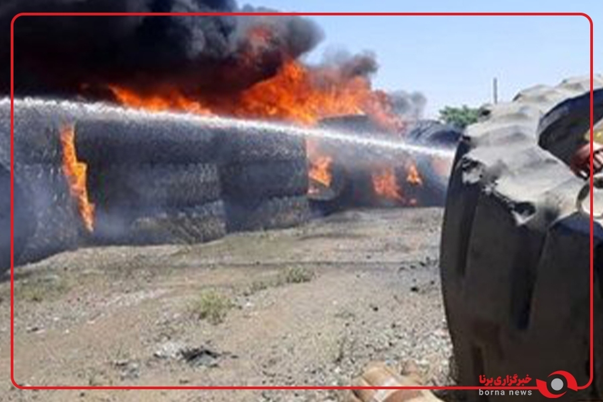 تلاش آتش‌نشانان برای اطفای حریق در انبار ضایعات لاستیک در تبریز