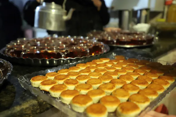 مراسم جزء خوانی قران کریم و برپایی سفره افطاری در ماه مبارک رمضان در مساجد و حسینیه های شهر کرمانشاه