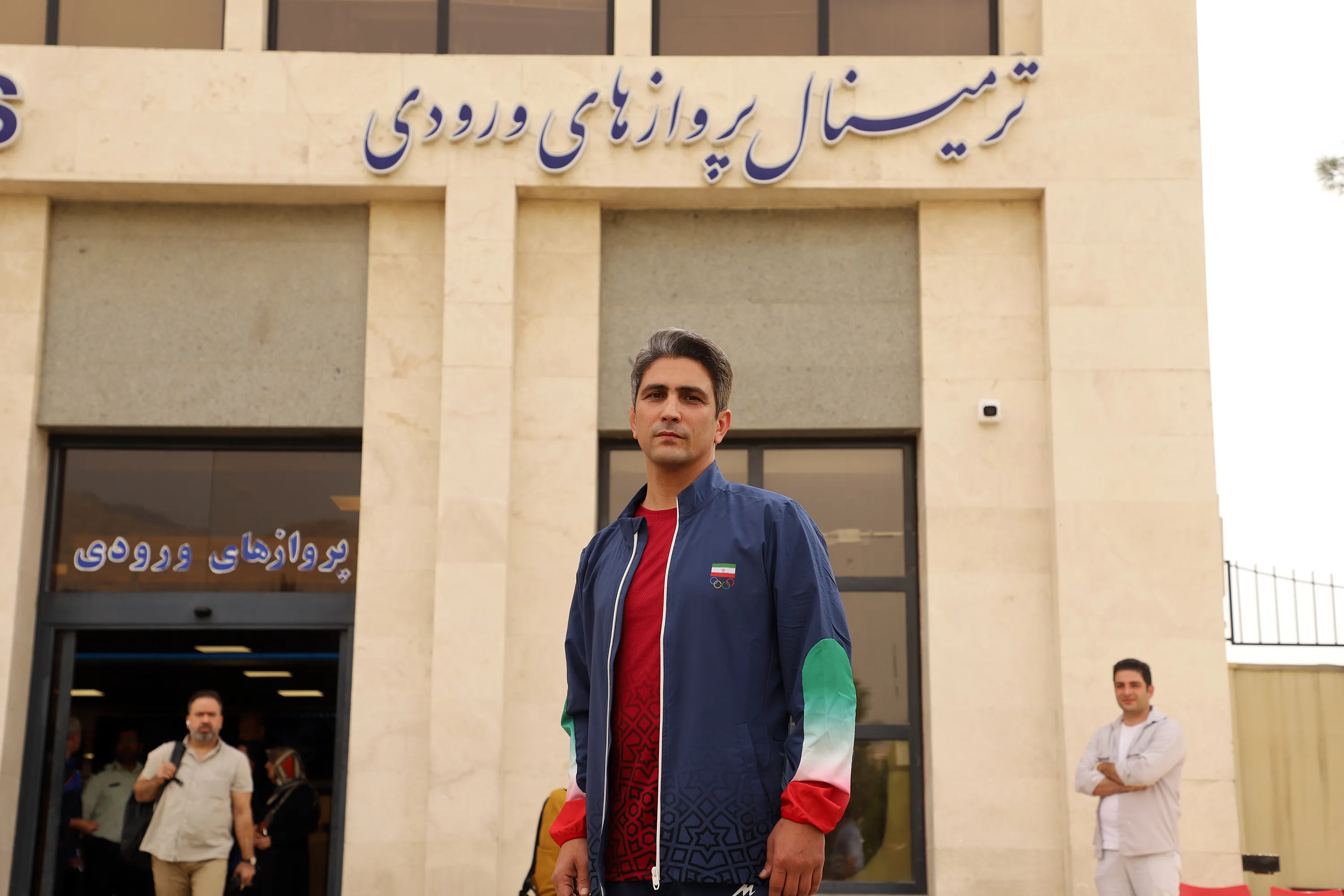 گزارش تصویری؛ مراسم استقبال از داور کشتی مسابقات آسیایی