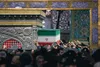 طواف پیکر رهبر شهید انقلاب بر گرد ضریح مطهر امام رضا(ع)