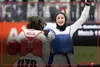 دور افتخار و بوسه آیلار جامی به پرچم ایران بعد از قهرمانی در بازی‌های پاراتکواندو آسیایی