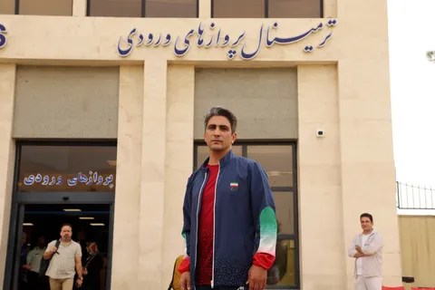 گزارش تصویری؛ مراسم استقبال از داور کشتی مسابقات آسیایی