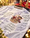 از امضای هنرمندان تا لبخند کودکان؛ حراج تی‌شرت «نگهبانان خورشید» برای مدارس سیستان و بلوچستان