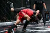 مسابقات هنرهای رزمی ترکیبی MMA در قم برگزار شد