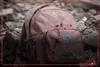 ادای احترام رئیس جمهور به تصاویر دانش‌آموزان شهید مدرسۀ میناب